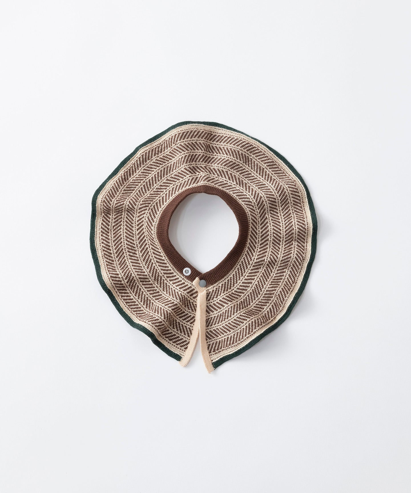 CABLE PATTERN KNIT BIB