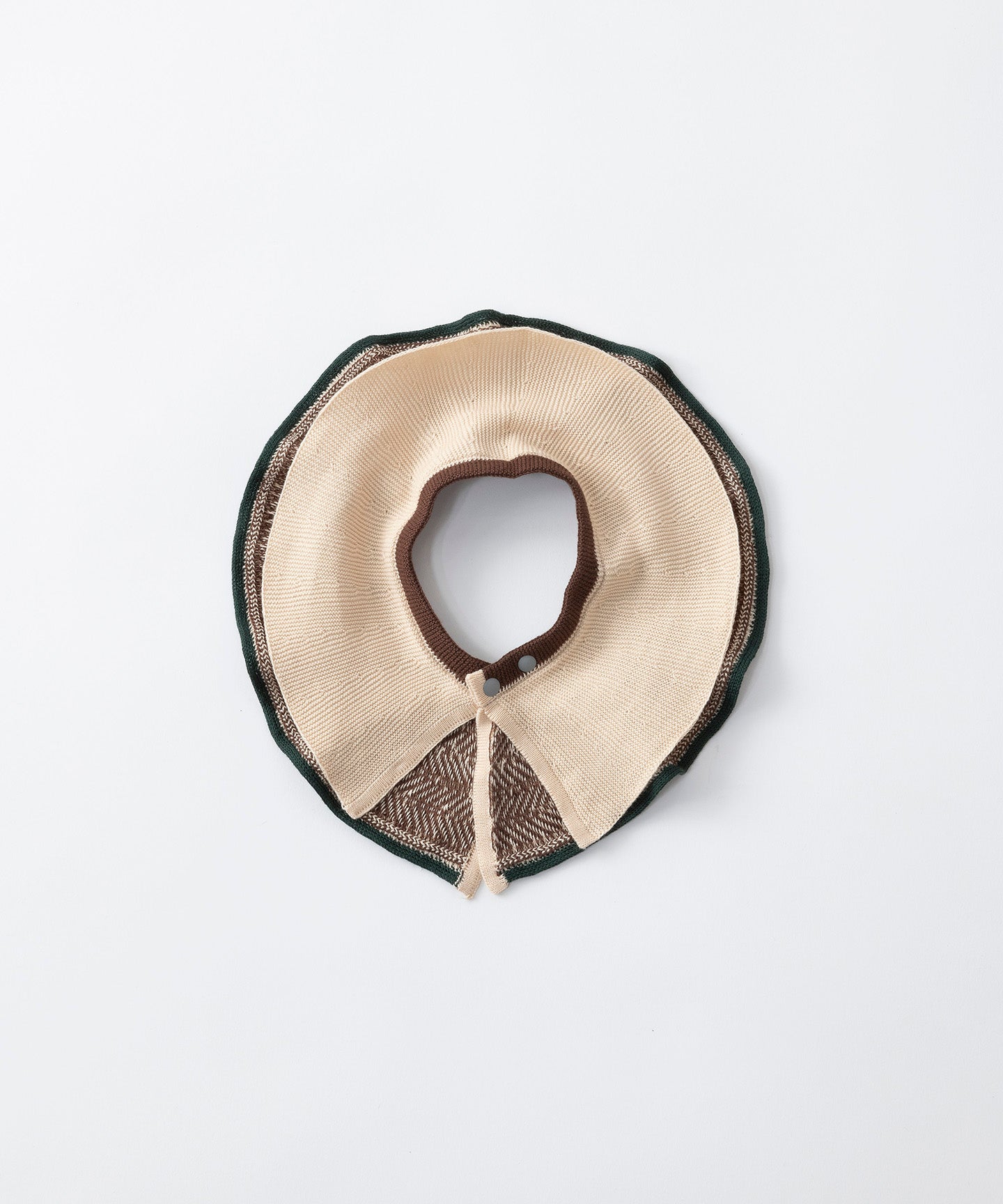 CABLE PATTERN KNIT BIB