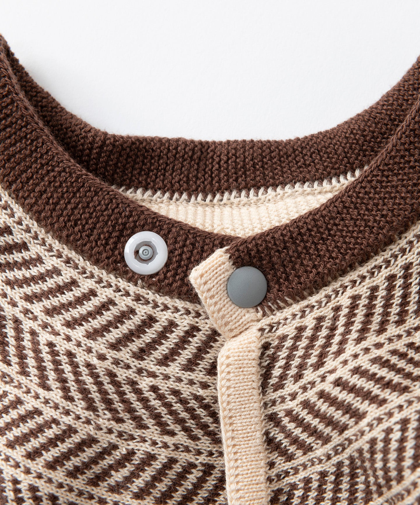 CABLE PATTERN KNIT BIB