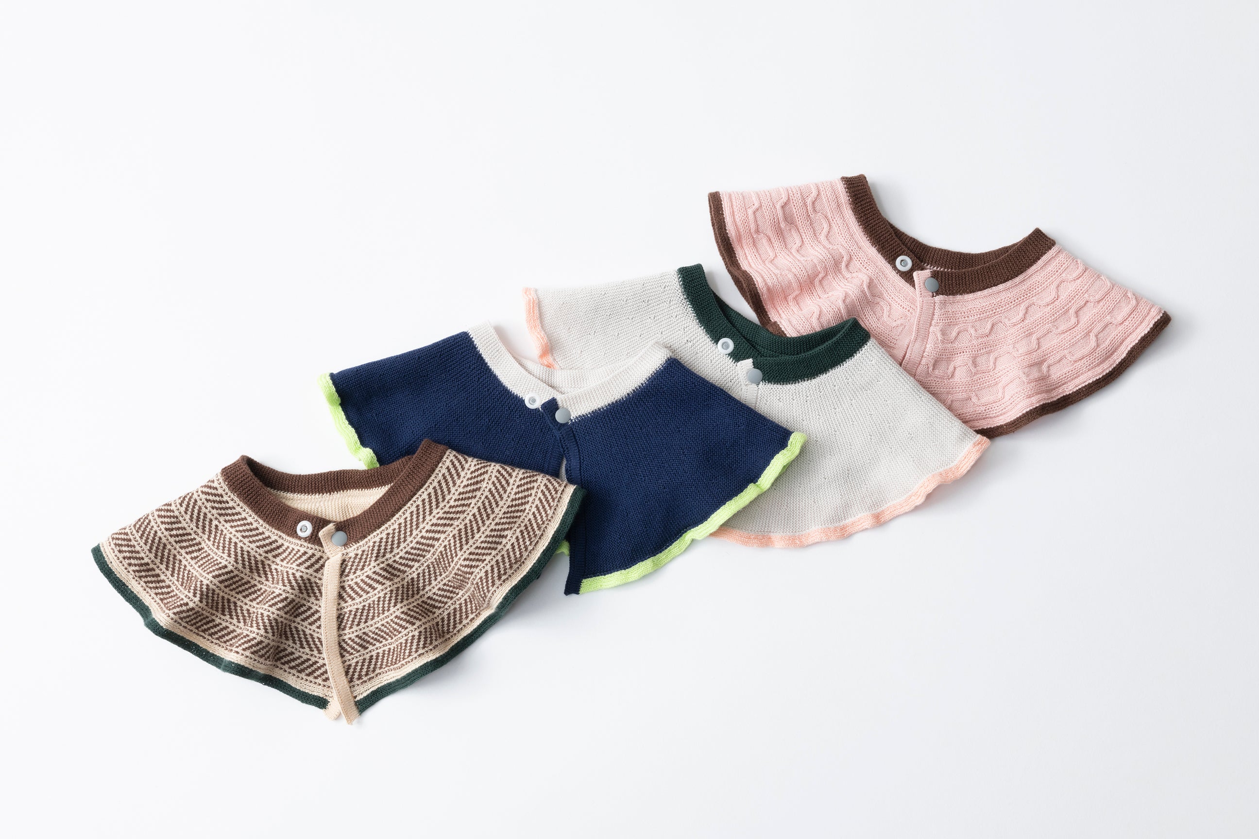 CABLE PATTERN KNIT BIB