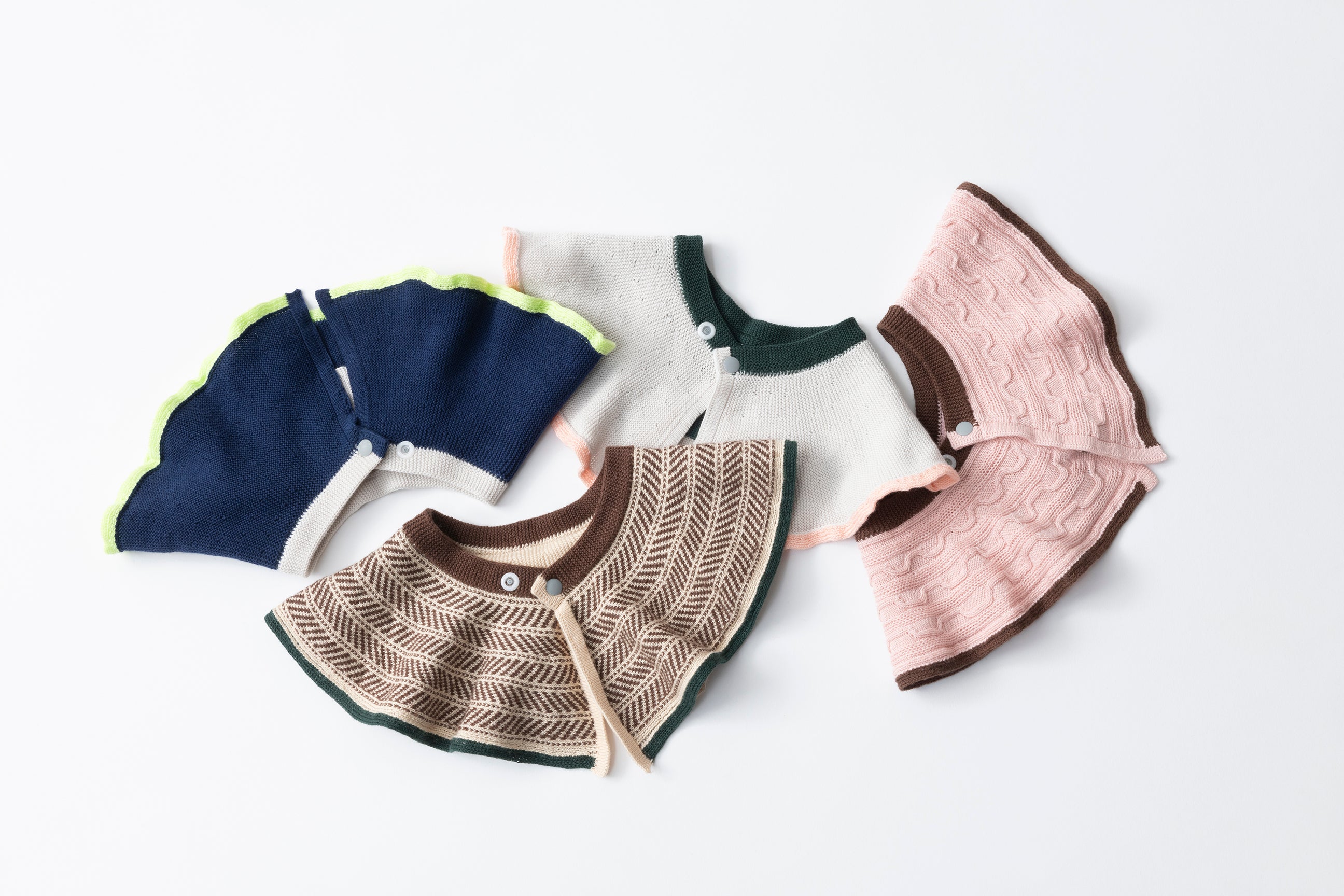 CABLE PATTERN KNIT BIB