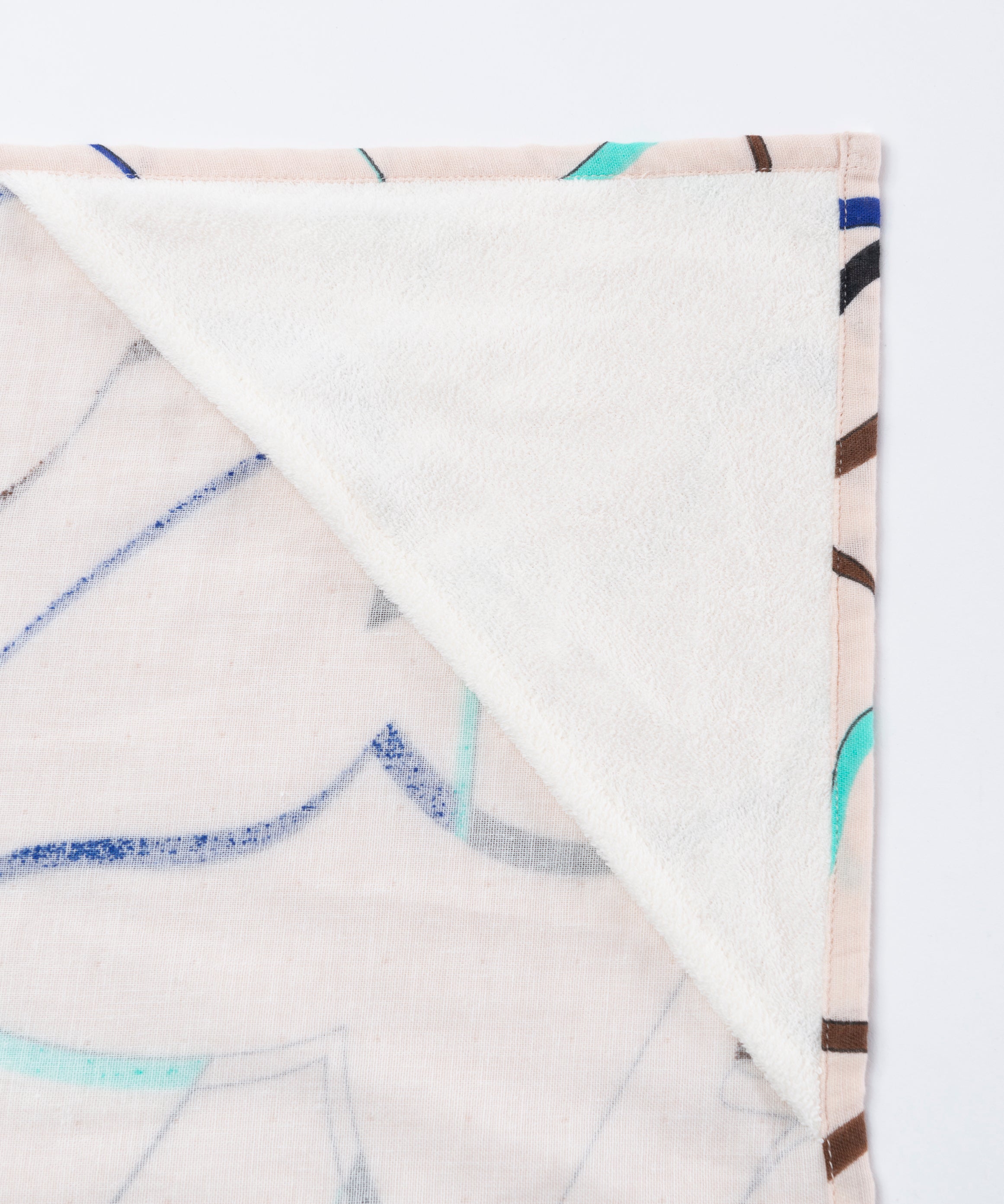 CUT RIBBON SWADDLE BLANKET