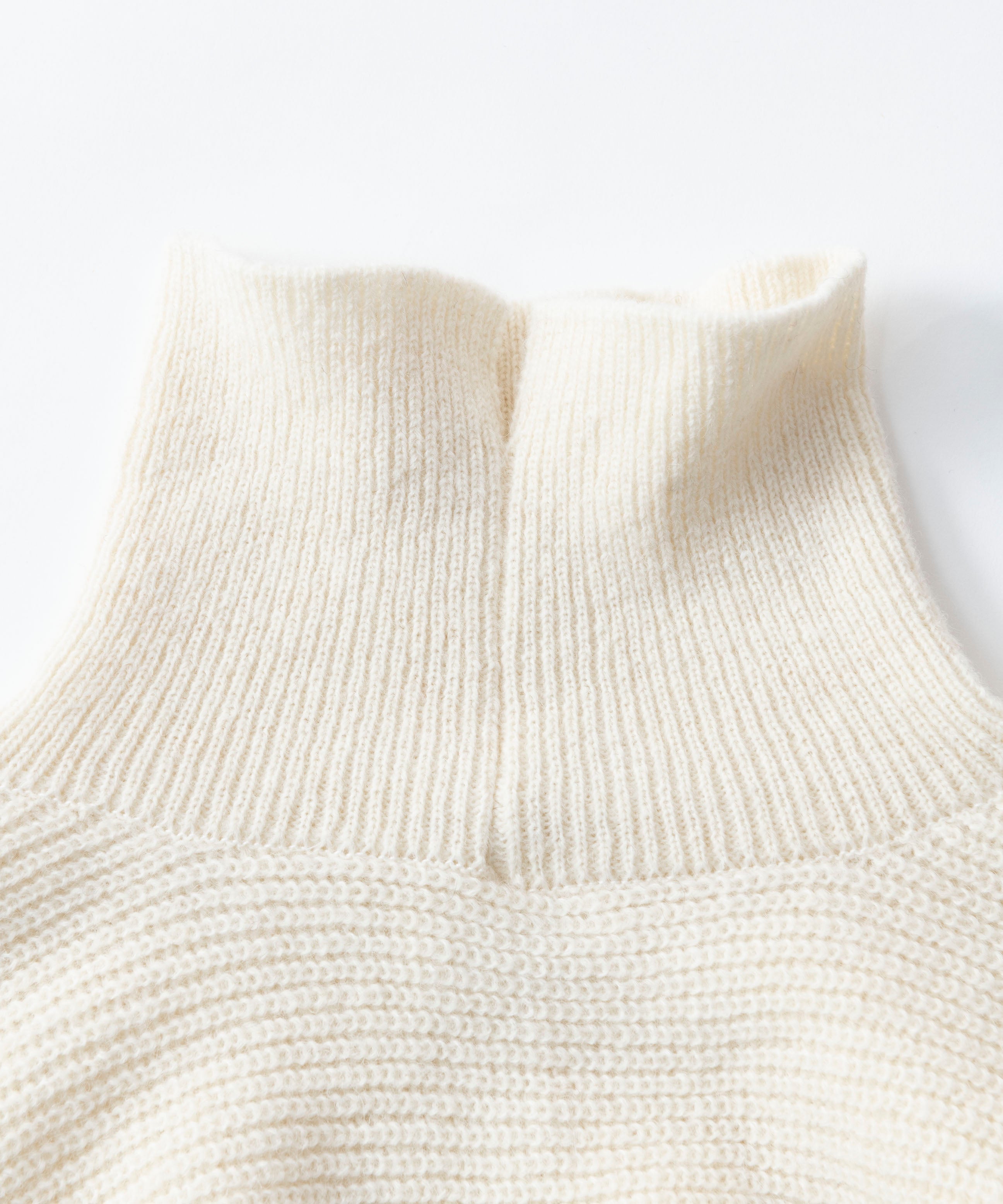 ARM SWEATER